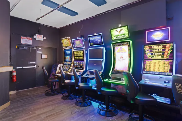 a view of a hallway with wooden floor and stairs