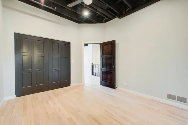 a bathroom with a sink a vanity and a mirror