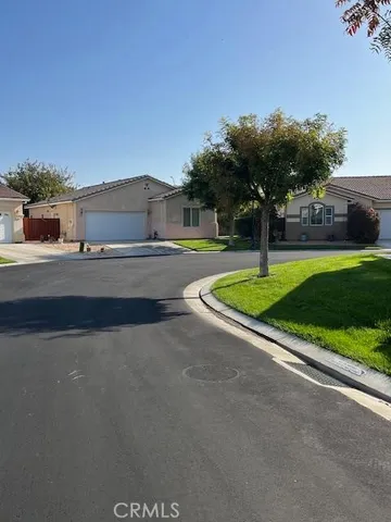 a house view with a garden space