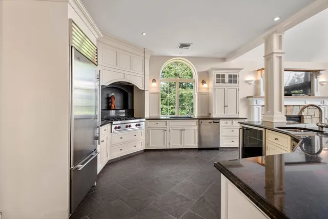 a view of a kitchen with a window