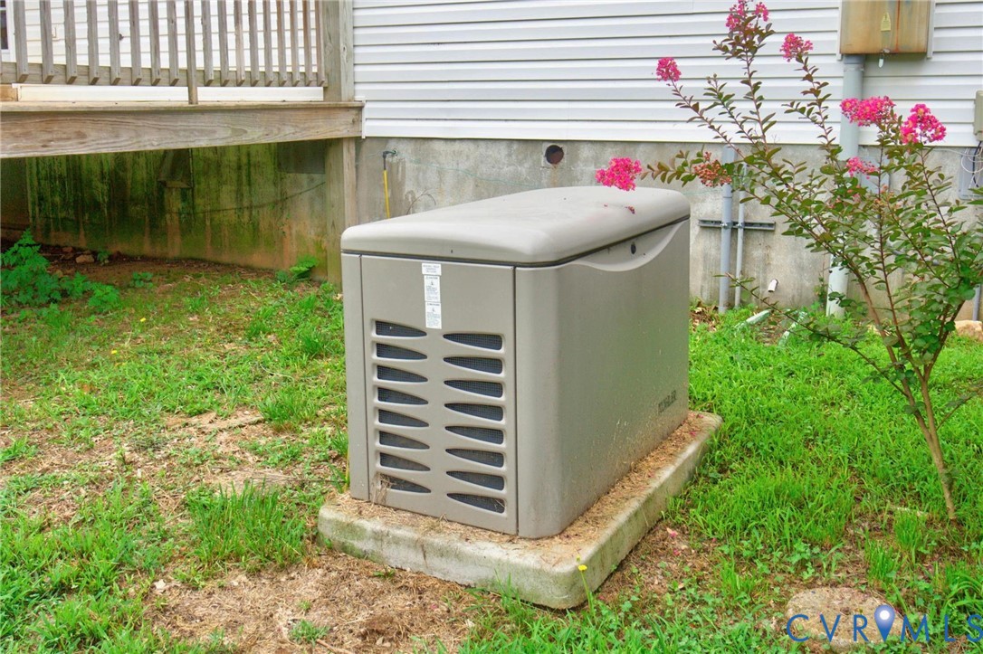 3007 Five Forks Road Pamplin, VA 23958 - Photo 62 of 82 Exterior whole-house generator on a concrete pad