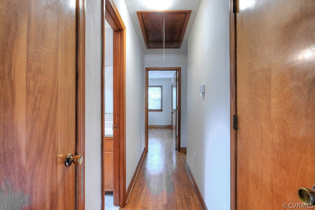 5126 Hackney Road North Chesterfield, VA 23234 - Photo 20 of 45 a view of a hallway with wooden floor