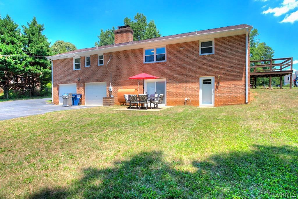 5126 Hackney Road North Chesterfield, VA 23234 - Photo 40 of 45 a front view of house with garden