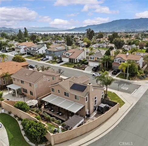 an aerial view of a house with a garden