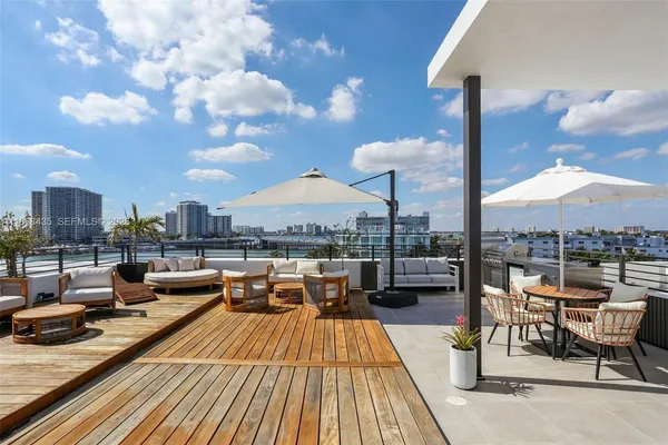 a view of a terrace with sitting area