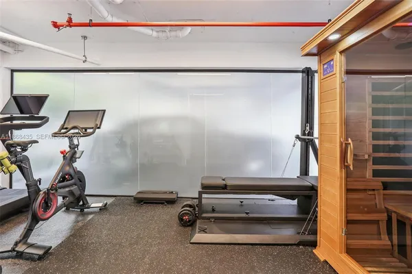 a view of a room with gym equipment