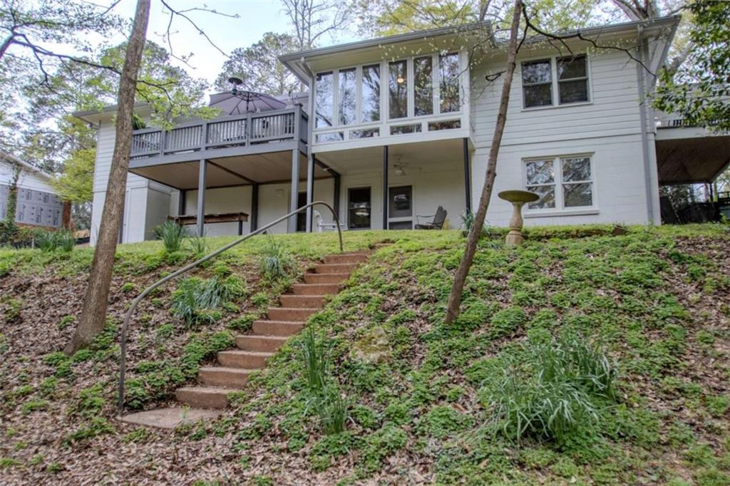849 Bobbin Mill Road Athens, GA 30606 - Photo 2 of 32 a view of a house with a yard and sitting area