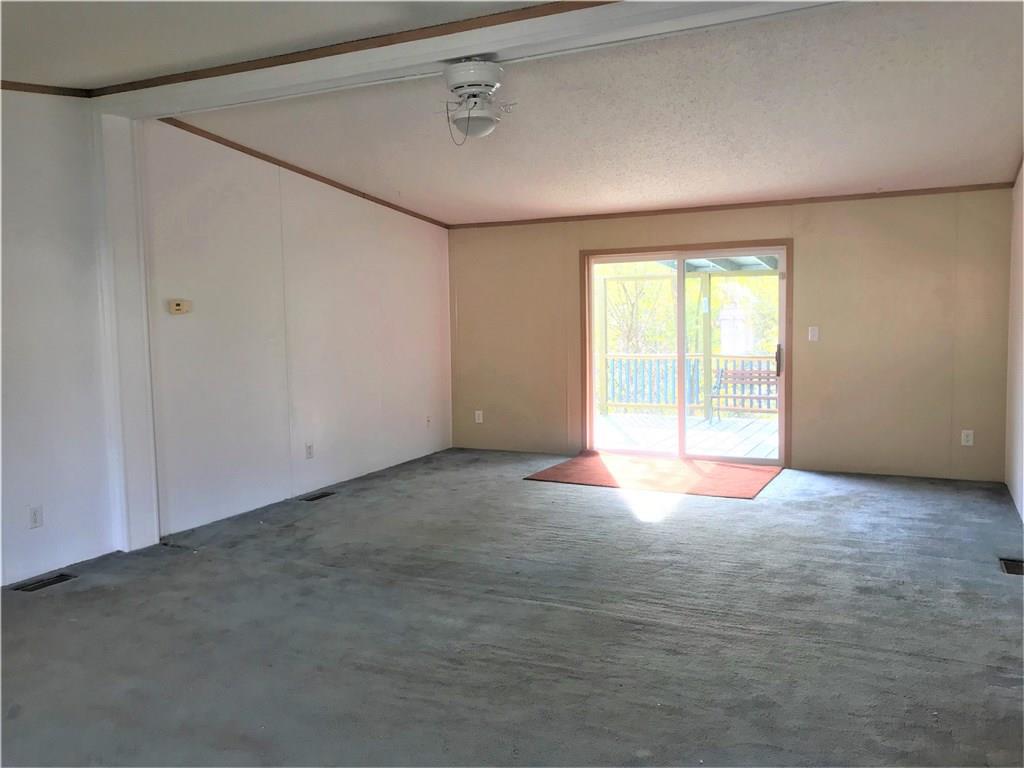 630 Deana Way Rochester, PA 15074 - Photo 8 of 21 Huge living room opens onto back deck.
