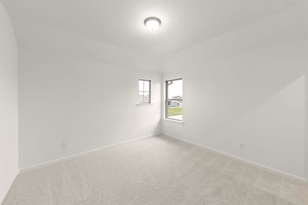 1443 Canadian Lane Van Alstyne, TX 75495 - Photo 20 of 24 21-1443-canadian-ln-van-alstyne-tx-bright-bedroom