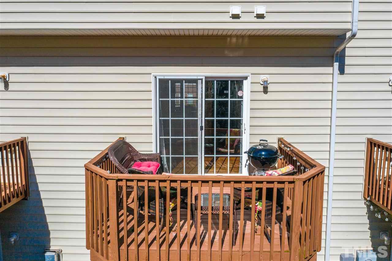 7621 Winners Edge Street Raleigh, NC 27617 - Photo 25 of 30 a view of balcony and deck