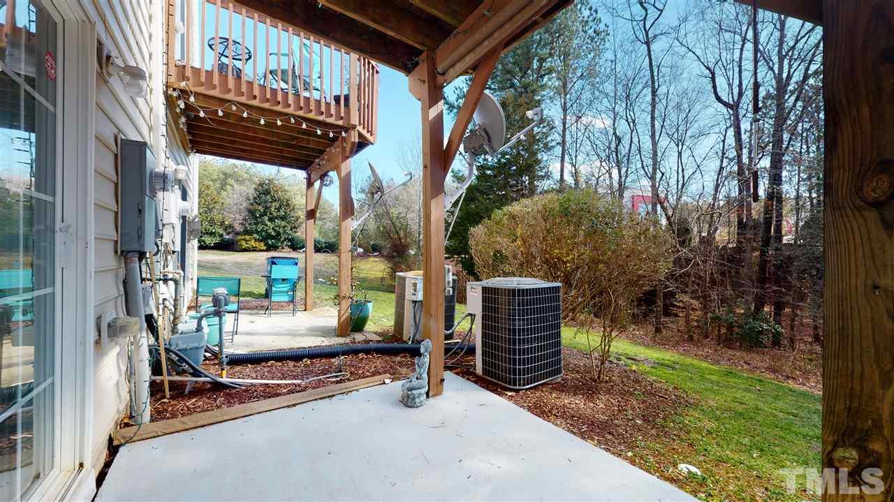 7621 Winners Edge Street Raleigh, NC 27617 - Photo 27 of 30 a view of outdoor space yard and patio