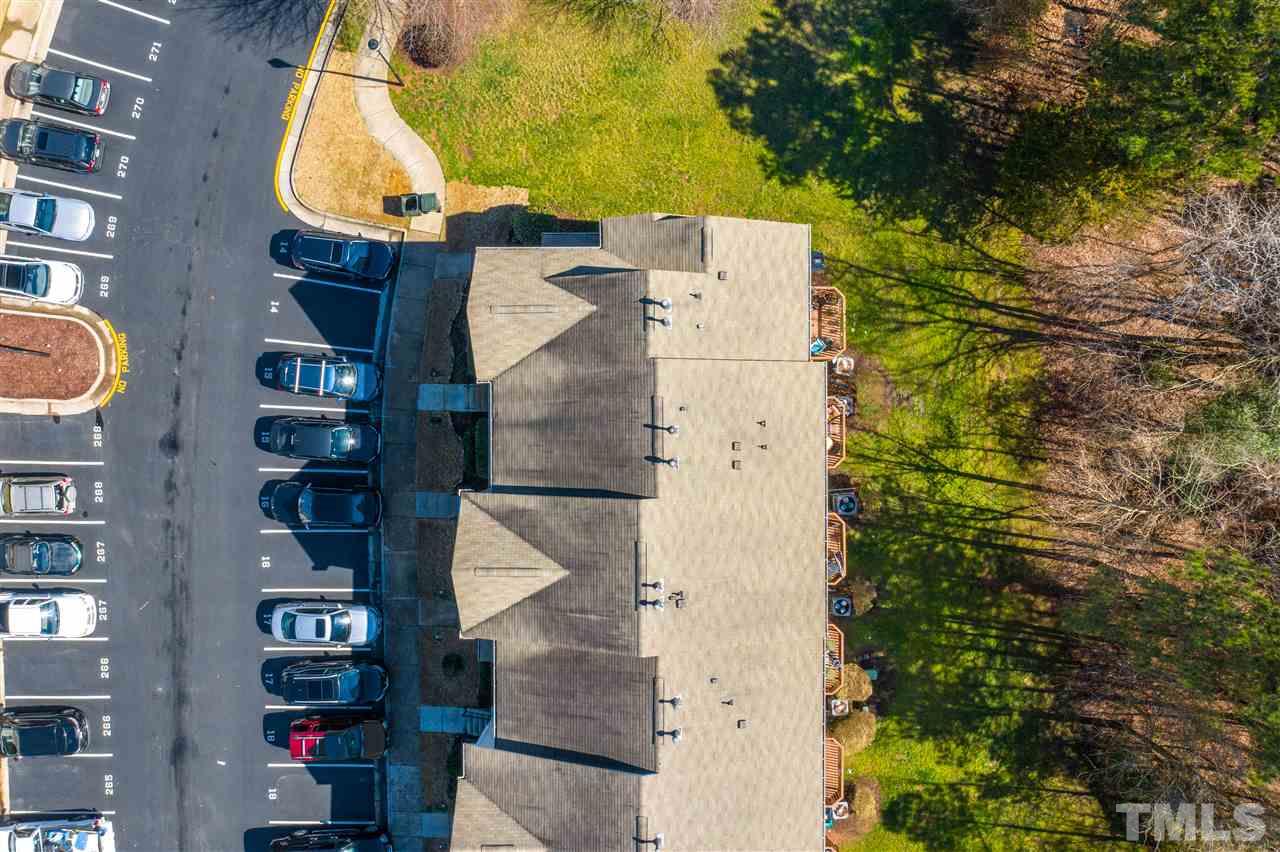 7621 Winners Edge Street Raleigh, NC 27617 - Photo 29 of 30 an aerial view of a residential apartment building with a yard