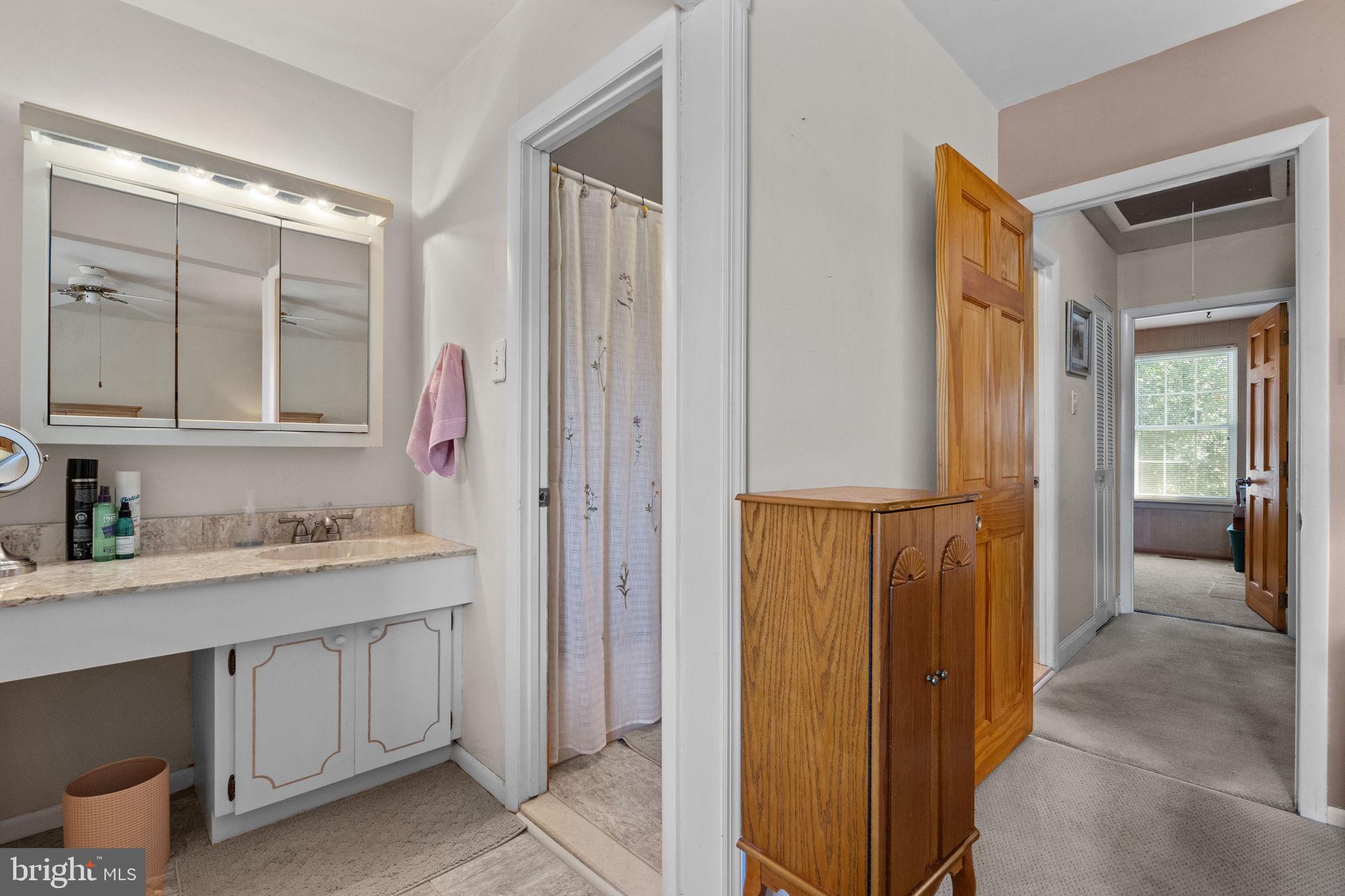 219 Nauldo Road Philadelphia, PA 19154 - Photo 16 of 32 Primary bedroom bathroom access