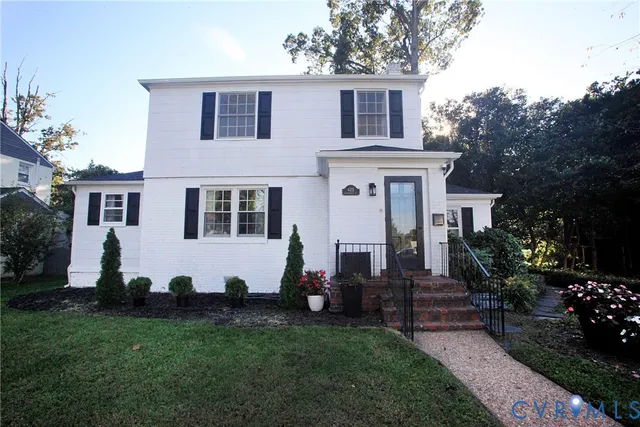 front view of a house with a yard