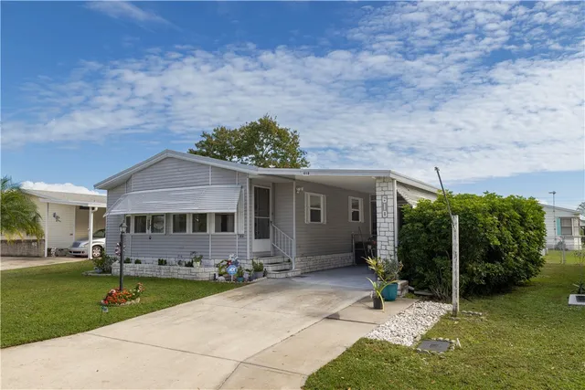 front view of house with a yard