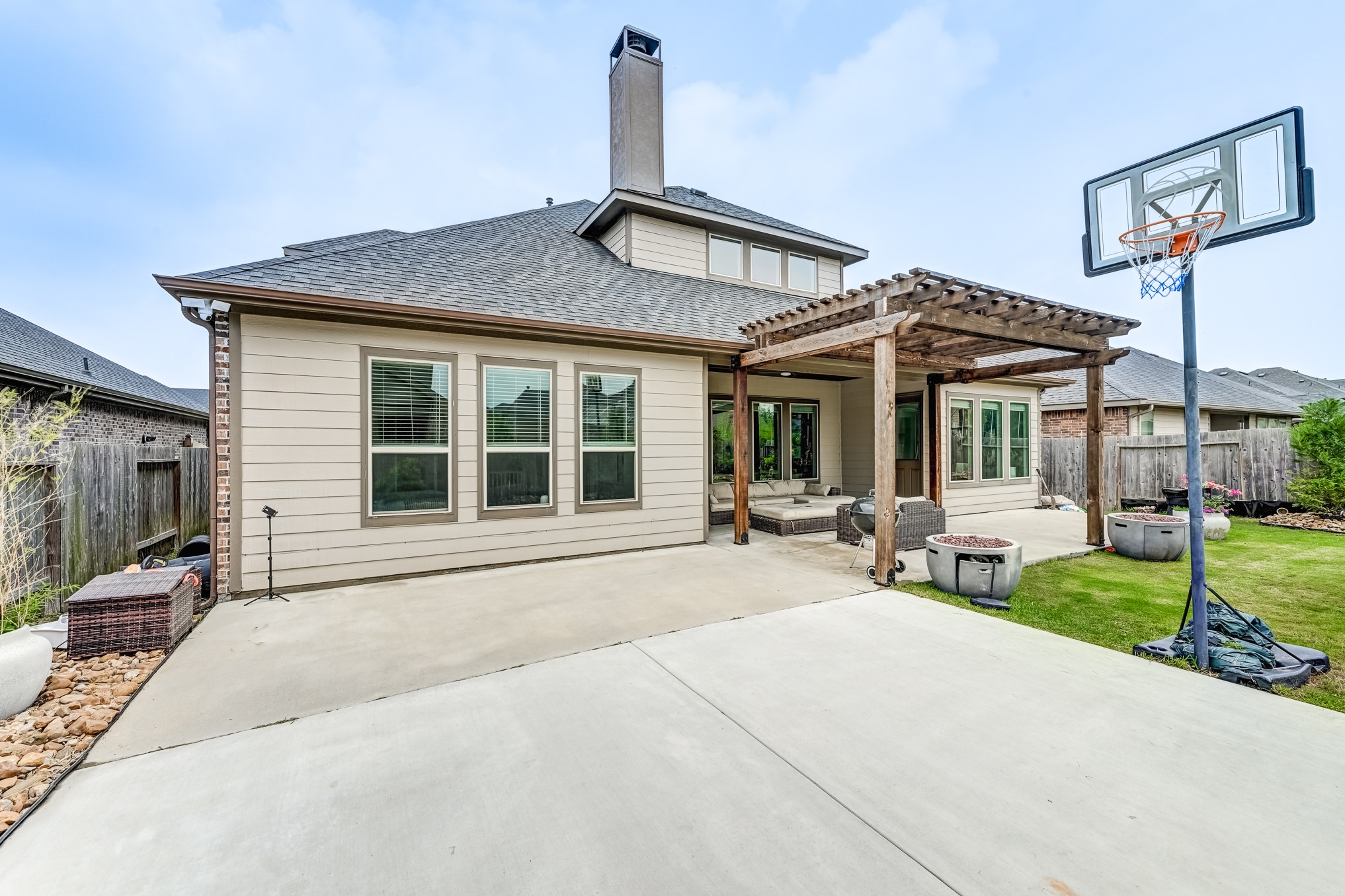 5806 Metaphor Way Rosenberg, TX 77469 - Photo 46 of 50 a front view of a house with patio