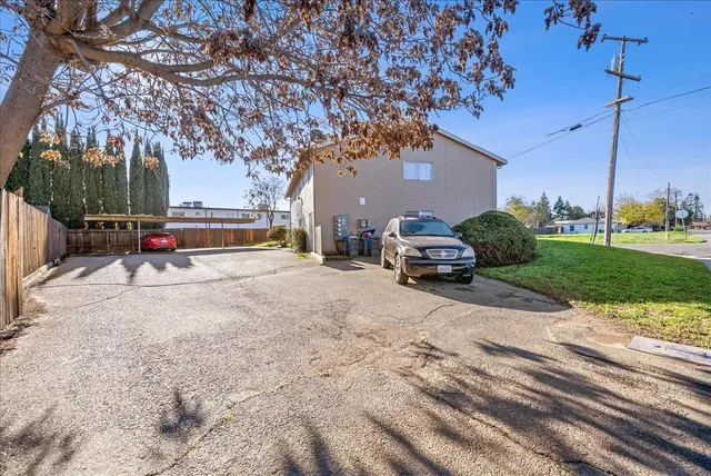 a view of dining room with furniture and wooden floor