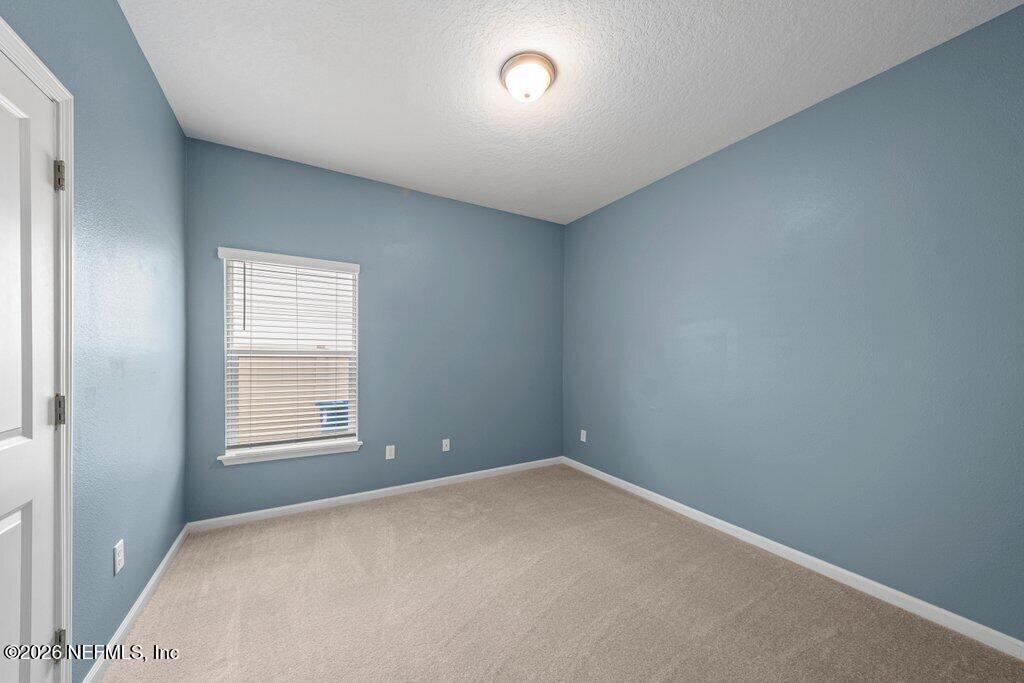200 Starnberg Ct Street St. Augustine, FL 32095 - Photo 12 of 48 an empty room with a window