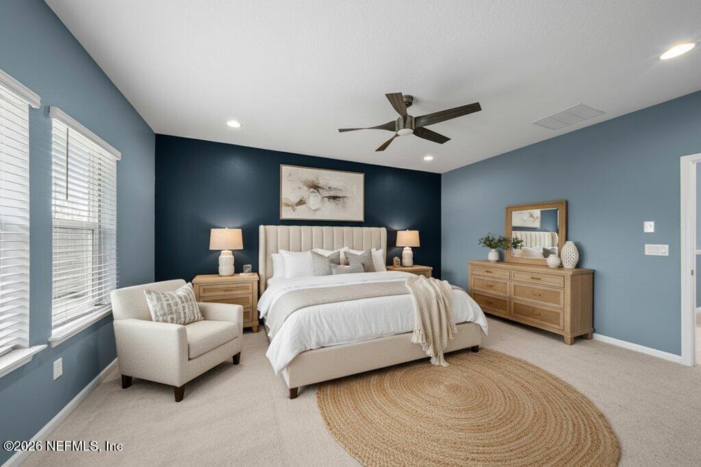 200 Starnberg Ct Street St. Augustine, FL 32095 - Photo 25 of 48 a bedroom with a bed and a couch