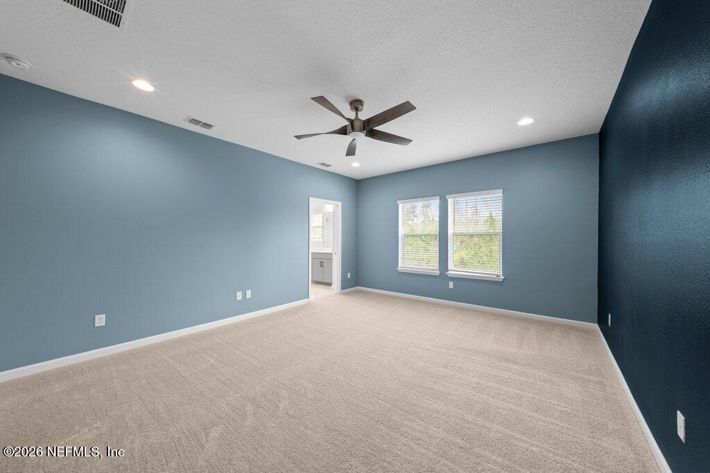 200 Starnberg Ct Street St. Augustine, FL 32095 - Photo 28 of 48 a view of a livingroom with a ceiling fan and window