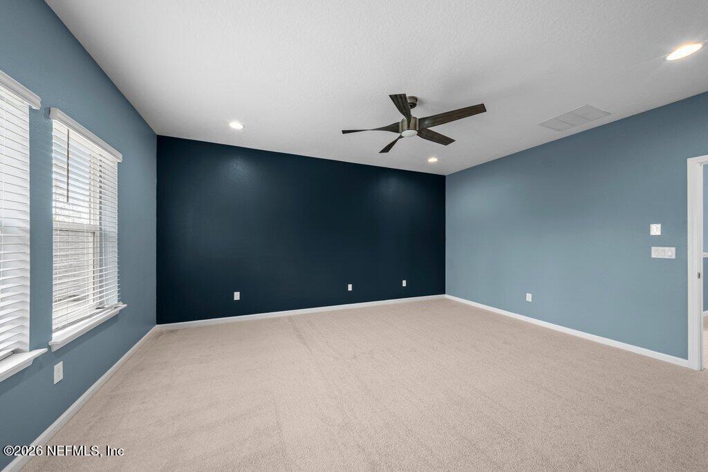 200 Starnberg Ct Street St. Augustine, FL 32095 - Photo 29 of 48 a view of a livingroom with a ceiling fan and window