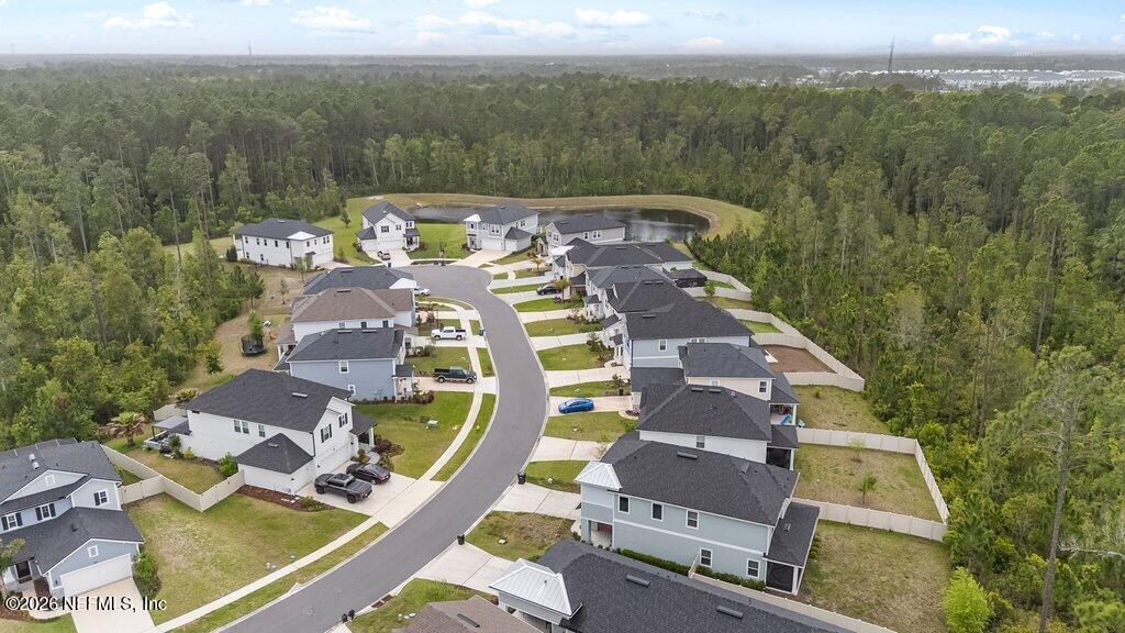 200 Starnberg Ct Street St. Augustine, FL 32095 - Photo 45 of 48 an aerial view of a house with a swimming pool