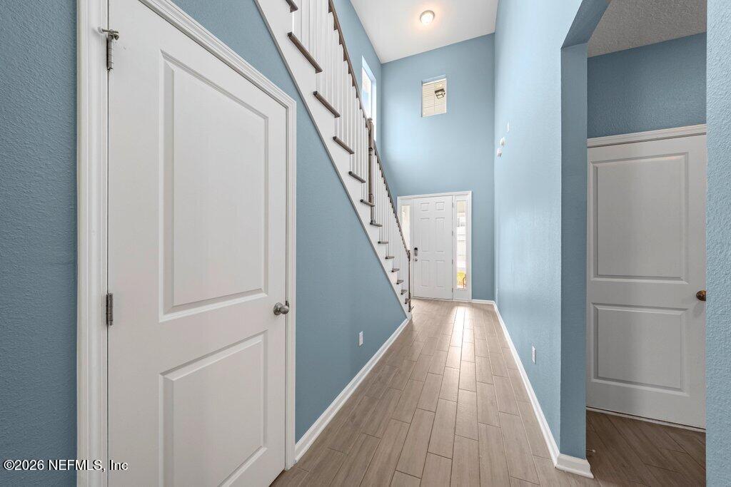 200 Starnberg Ct Street St. Augustine, FL 32095 - Photo 9 of 48 a view of hallway with stairs