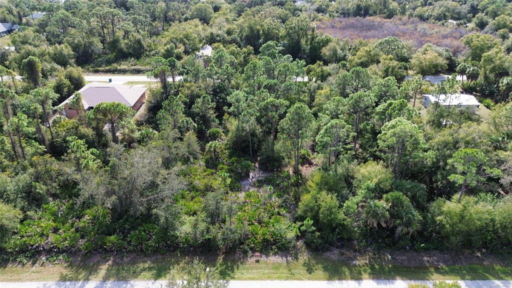 23431 Racine Avenue Punta Gorda, FL 33980 - Photo 3 of 4 an aerial view of a house with a yard