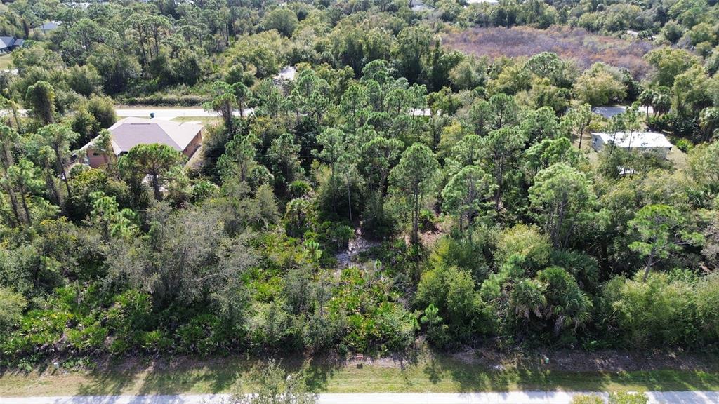 23431 Racine Avenue Punta Gorda, FL 33980 - Photo 4 of 4 an aerial view of a house with a yard