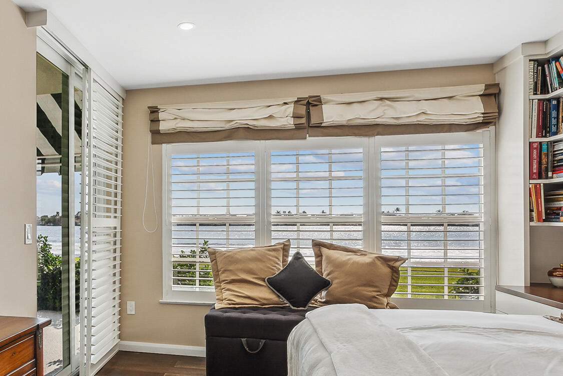 2160 Ibis Isle Road, Unit 1 Palm Beach, FL 33480 - Photo 13 of 44 a living room with furniture and a window