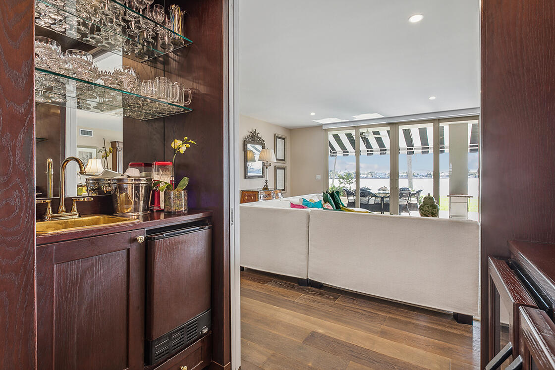 2160 Ibis Isle Road, Unit 1 Palm Beach, FL 33480 - Photo 17 of 44 a kitchen with stainless steel appliances granite countertop a refrigerator and a sink