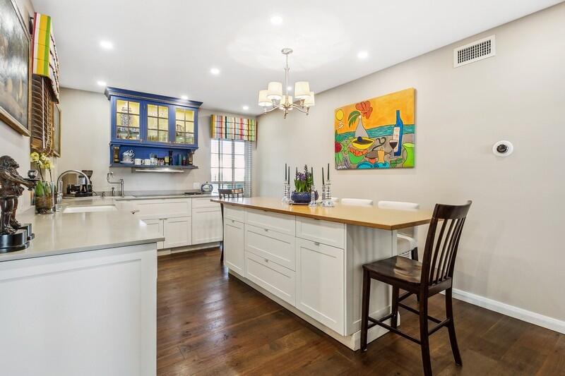 2160 Ibis Isle Road, Unit 1 Palm Beach, FL 33480 - Photo 20 of 44 a kitchen with a sink cabinets and window