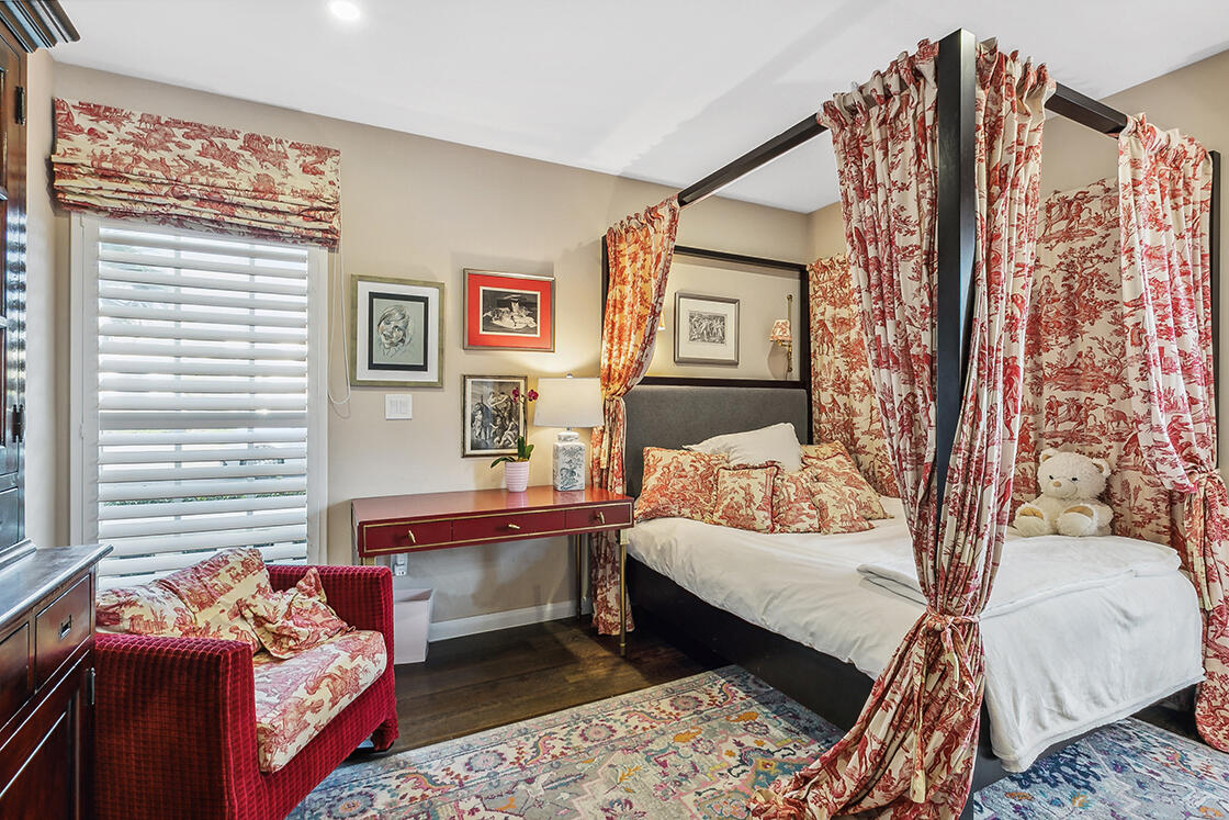 2160 Ibis Isle Road, Unit 1 Palm Beach, FL 33480 - Photo 22 of 44 a bedroom with a bed and a couch