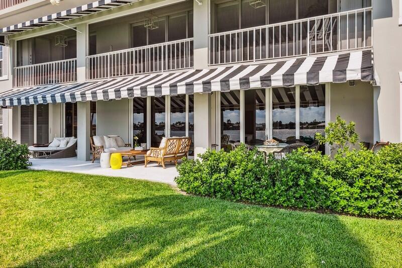 2160 Ibis Isle Road, Unit 1 Palm Beach, FL 33480 - Photo 29 of 44 a view of a house with a yard and sitting area
