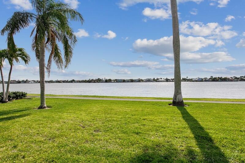 2160 Ibis Isle Road, Unit 1 Palm Beach, FL 33480 - Photo 31 of 44 a view of a ocean with a big yard