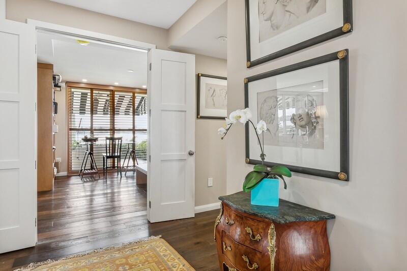 2160 Ibis Isle Road, Unit 1 Palm Beach, FL 33480 - Photo 9 of 44 a living room with furniture and a gate