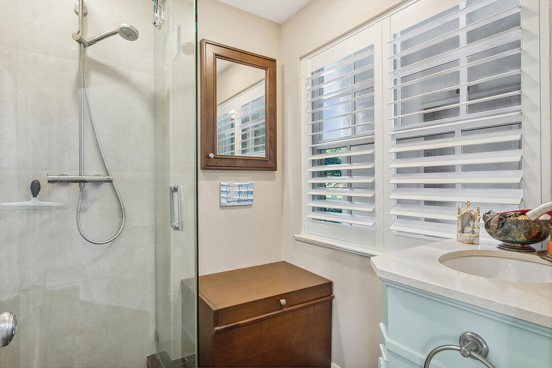 2160 Ibis Isle Road, Unit 1 Palm Beach, FL 33480 - Photo 10 of 44 a bathroom with a sink a toilet and a shower