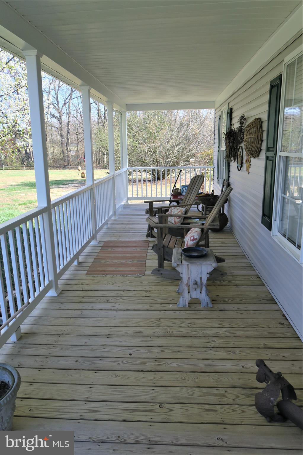 Full length front porch for morning coffee.