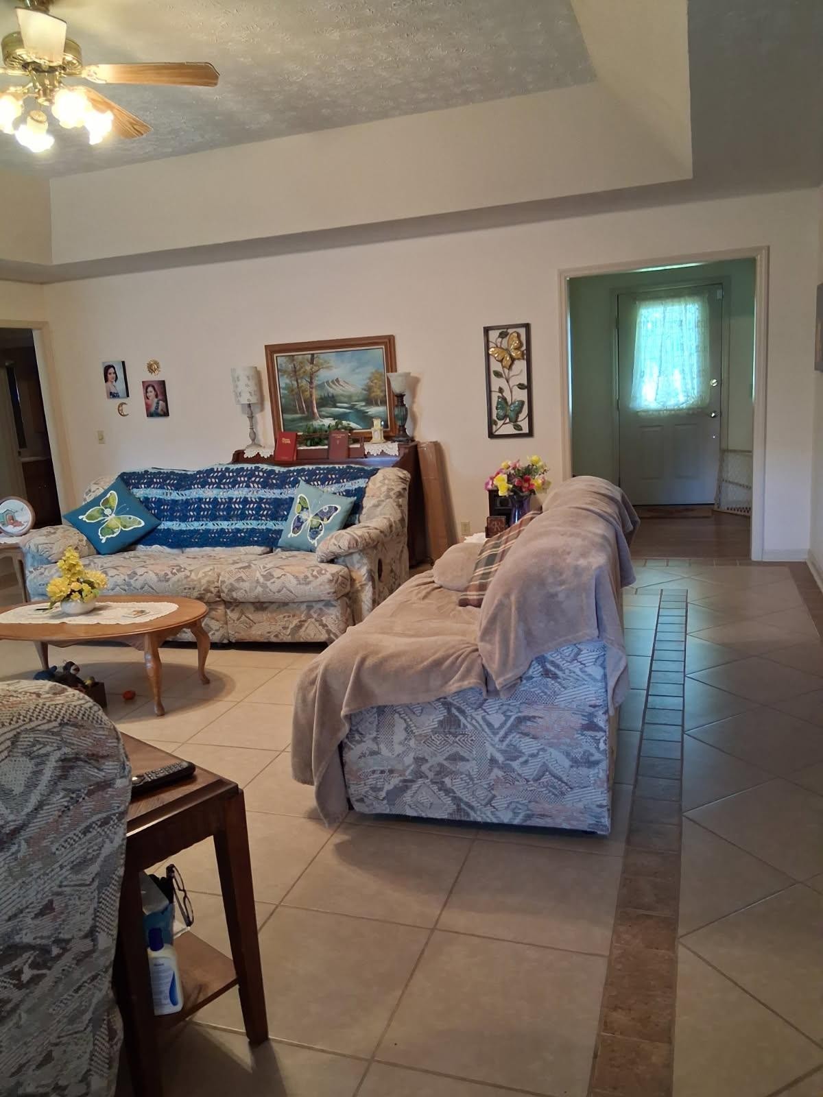 3168 Maxey Road Cedar Hill, TN 37032 - Photo 23 of 40 a living room with furniture and a lamp