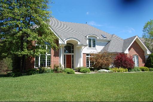 5 Clubside Court Burr Ridge, IL 60527 - Photo 1 of 1 a front view of house with yard and green space