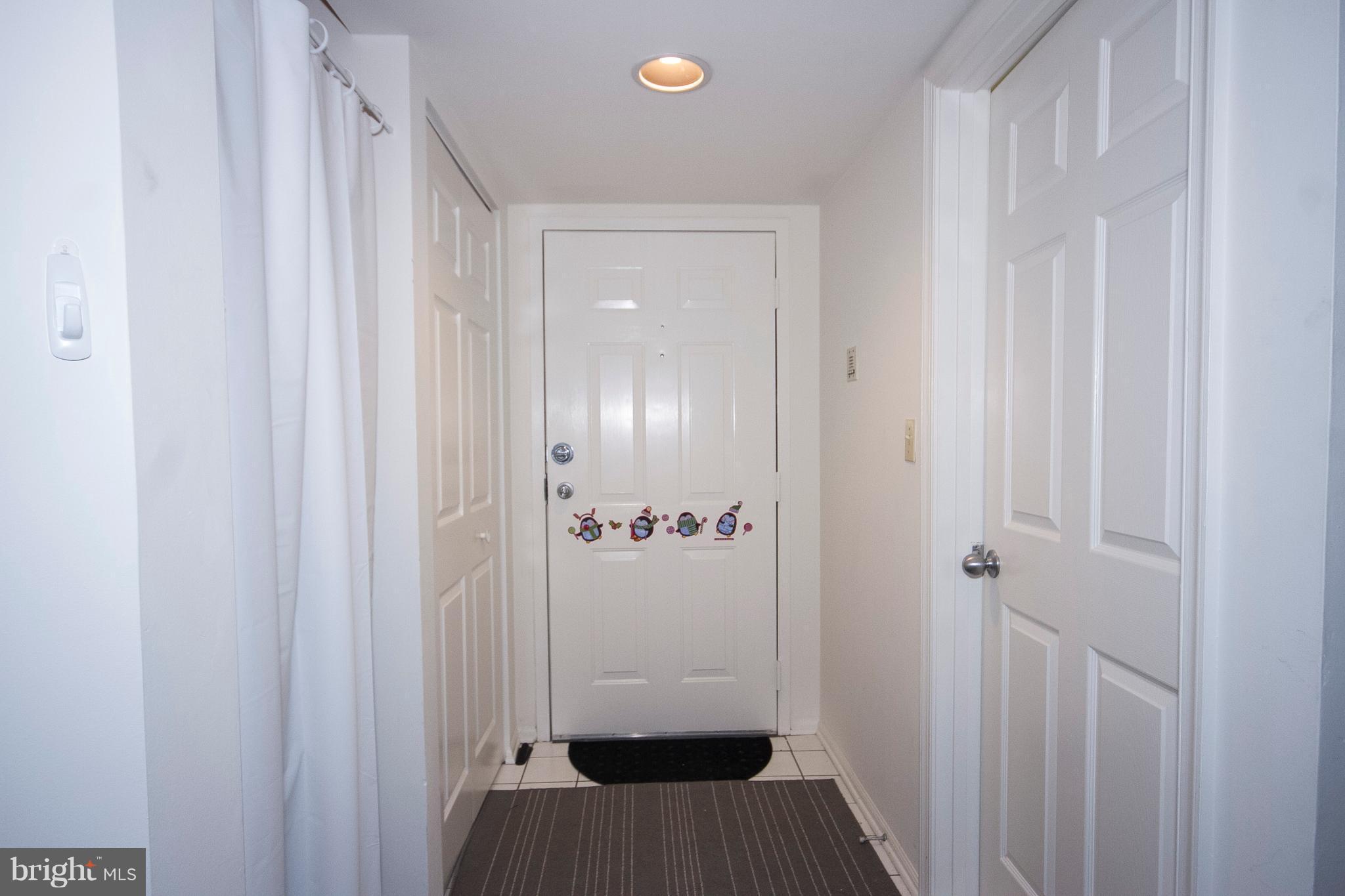 2901 Fallstaff Road, Unit 504 Baltimore, MD 21209 - Photo 3 of 22 a view of a bedroom with a wardrobe space