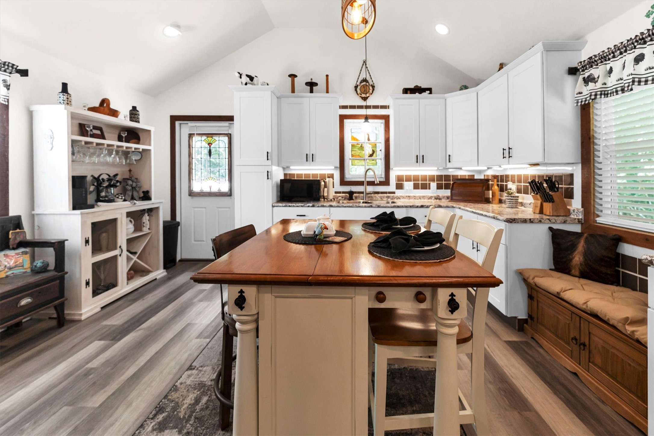 2075 Mangum Road Livingston, TX 77351 - Photo 13 of 45 a kitchen with stainless steel appliances a table chairs and a refrigerator