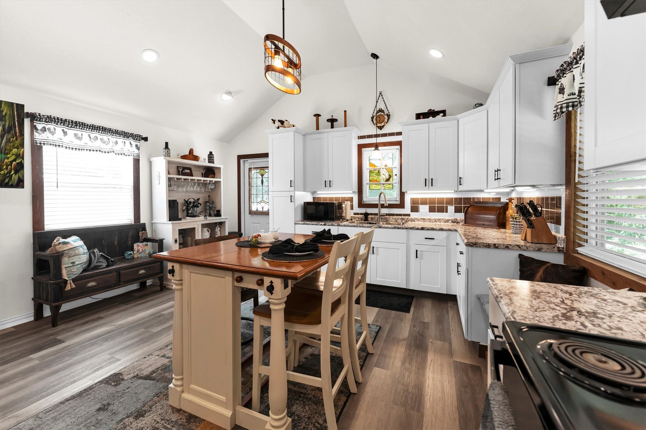 2075 Mangum Road Livingston, TX 77351 - Photo 14 of 45 a kitchen with stainless steel appliances a stove a sink a refrigerator and chairs