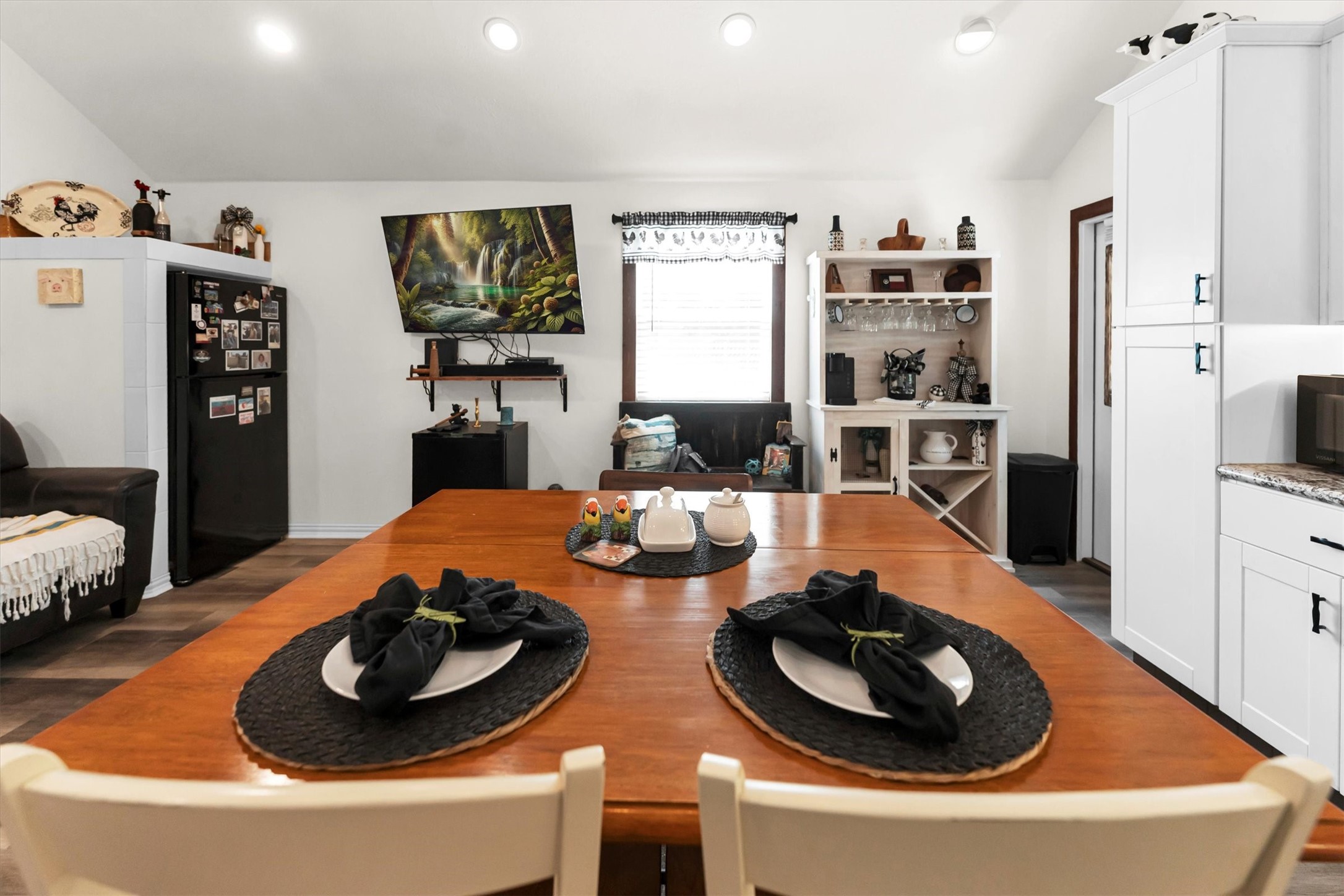 2075 Mangum Road Livingston, TX 77351 - Photo 16 of 45 a dining room with furniture and wooden floor