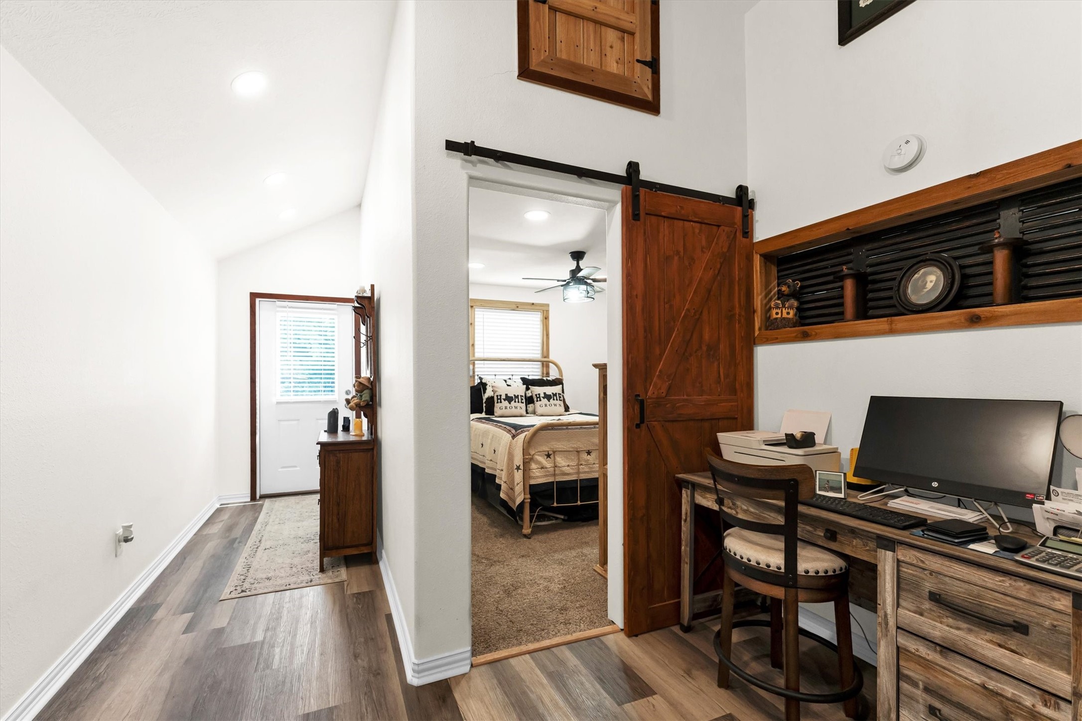 2075 Mangum Road Livingston, TX 77351 - Photo 23 of 45 a view of a livingroom with furniture and a flat screen tv