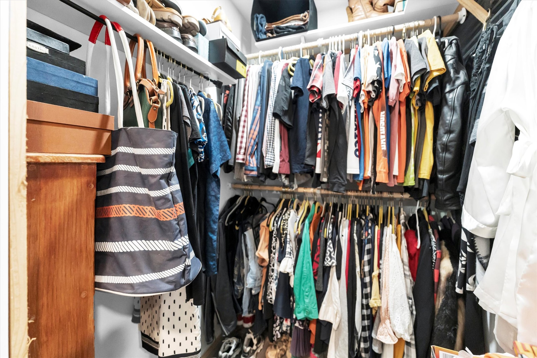 2075 Mangum Road Livingston, TX 77351 - Photo 29 of 45 a view of walk in closet with clothes and shoes