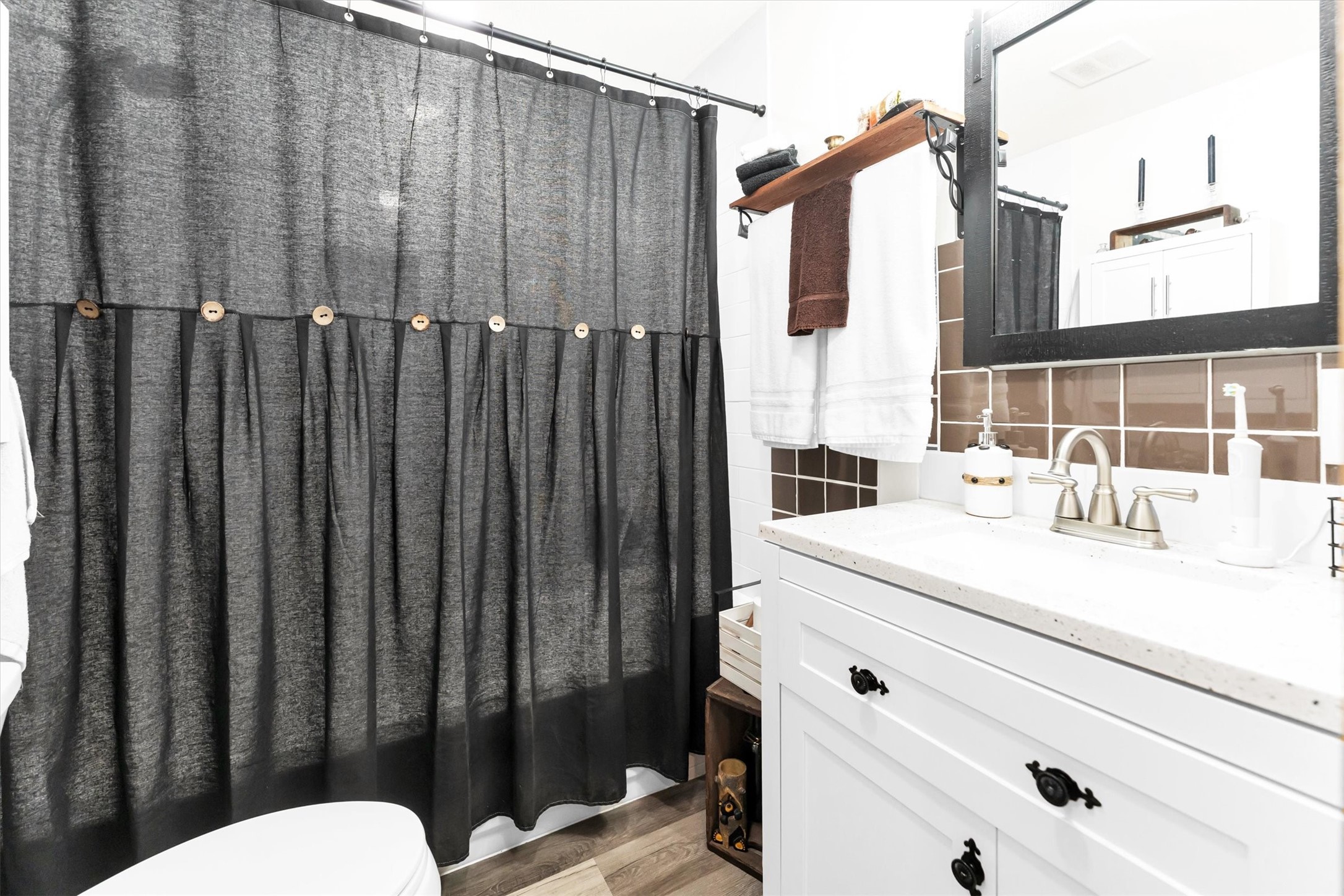 2075 Mangum Road Livingston, TX 77351 - Photo 30 of 45 a bathroom with a sink and a mirror