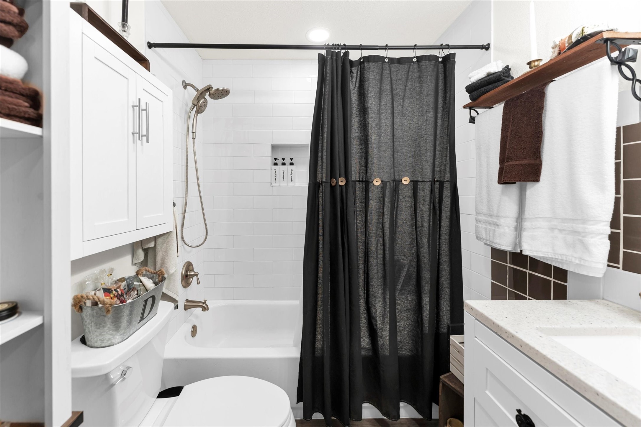 2075 Mangum Road Livingston, TX 77351 - Photo 31 of 45 a bathroom with a sink a toilet and shower