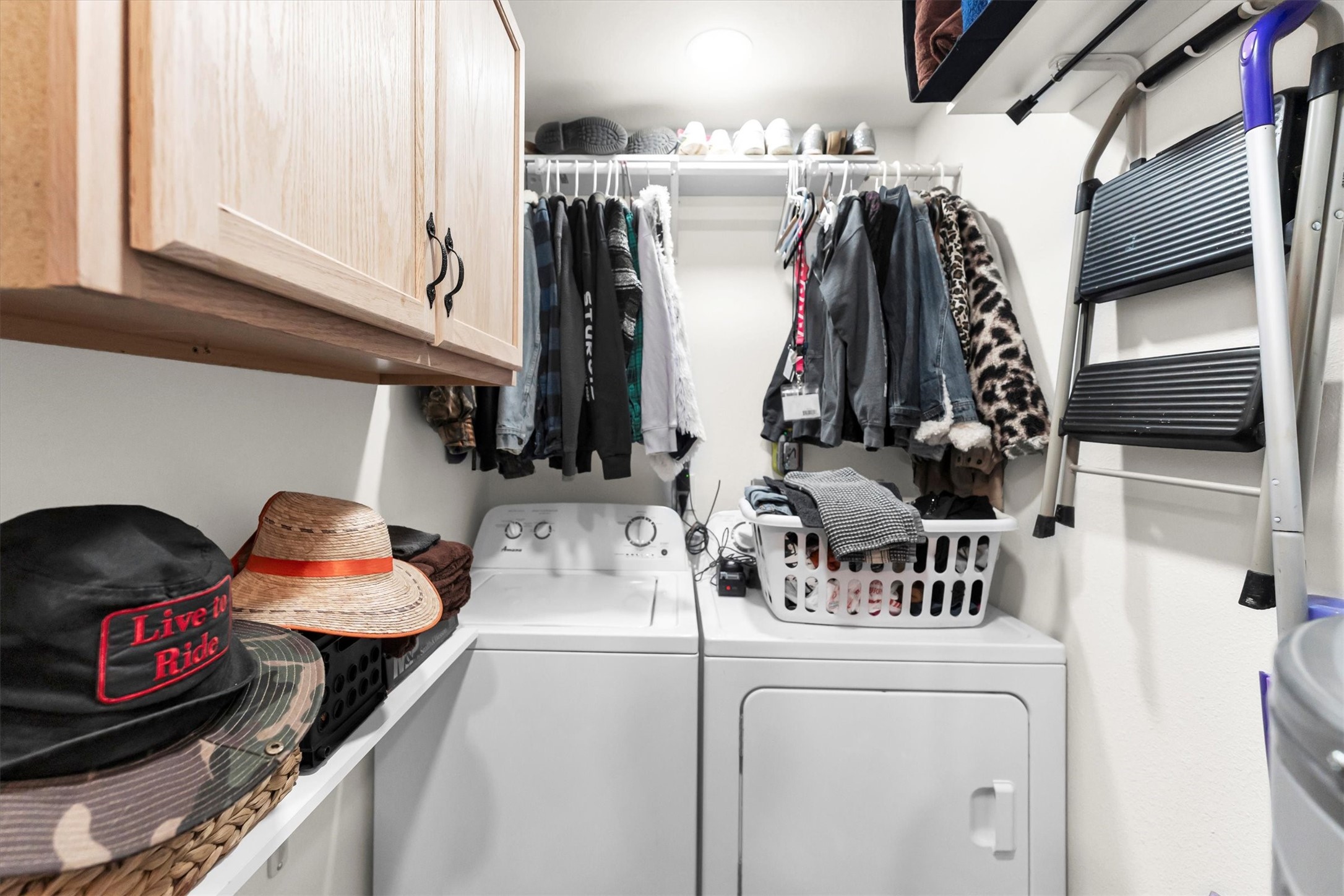 2075 Mangum Road Livingston, TX 77351 - Photo 32 of 45 a view of walk in closet with clothes and shoes