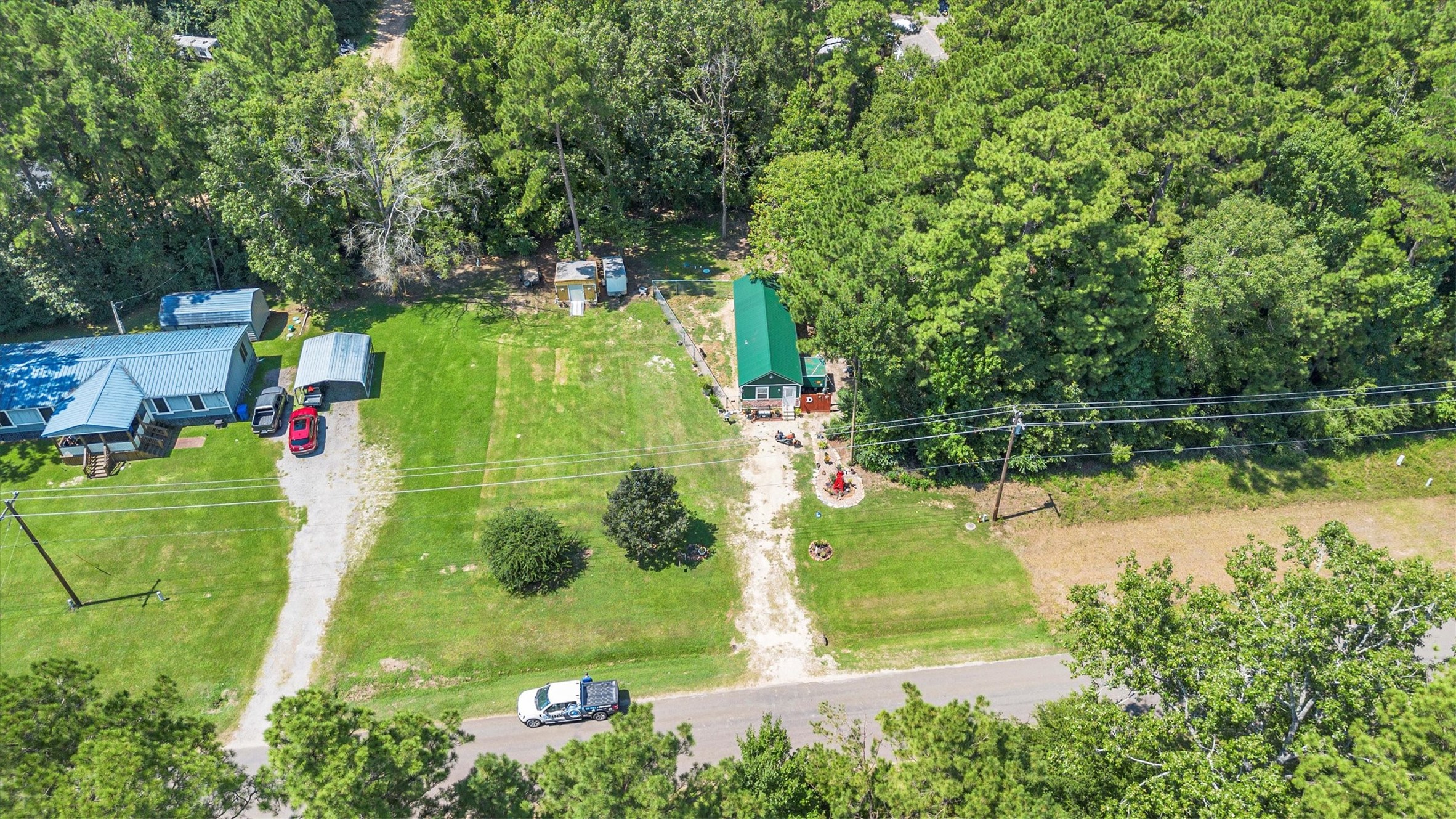 2075 Mangum Road Livingston, TX 77351 - Photo 36 of 45 an aerial view of a houses with outdoor space